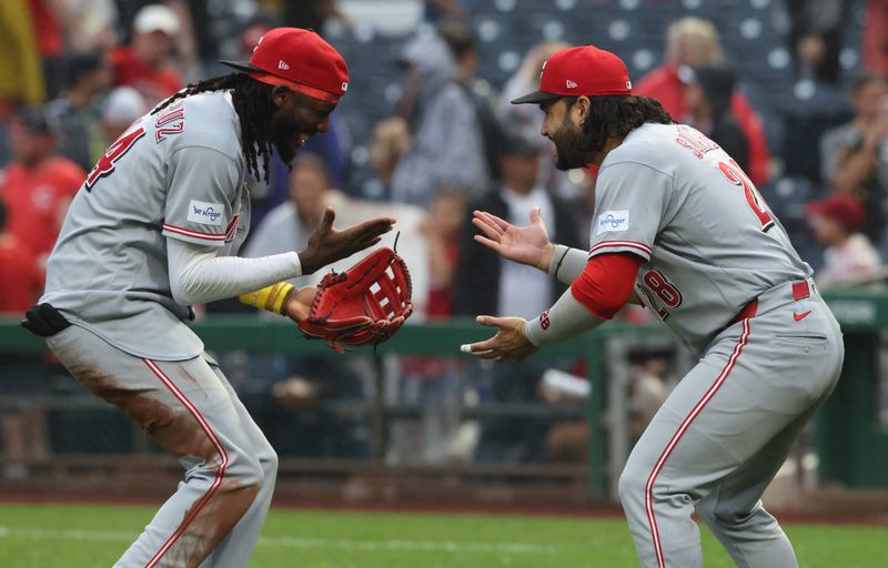 Elly de la Cruz  and Eugenio Suárez celebrate after defeating the Pittsburgh Pirates 9-7 at PNC Park Saturday, June 27. Suarez's three-run homer in the ninth inning was the difference in the 9-7 victory.