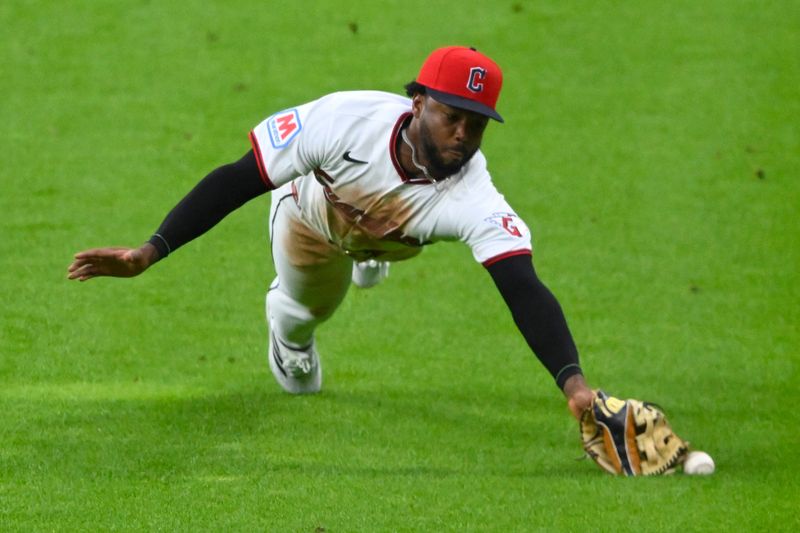 Jun 27, 2026; Cleveland, Ohio, USA; Cleveland Guardians right fielder Kahlil Watson (31) reaches for the ball on a single by Seattle Mariners left fielder Randy Arozarena (not pictured) in the sixth inning at Progressive Field. Mandatory Credit: David Richard-Imagn Images