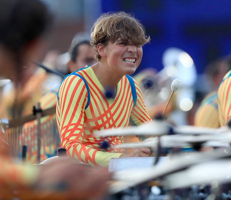 A Bluecoats drummer gets into his music during the 2026 Bluecoats Opening Night Community Celebration at Kehres Stadium at University of Mount Union in Alliance.