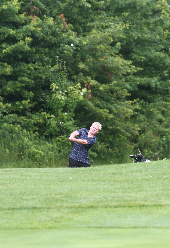Licking Valley's Jackson Gieseler pitches onto the No. 8 green during a Licking County Junior Golf Association event at Willow Run on June 29, 2026.