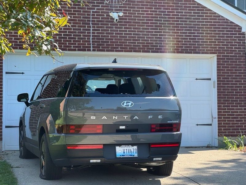 A vehicle parked in the driveway where the shooting took place had shattered windows, flat tires and multiple small holes in its silver exterior the morning of July 4.
