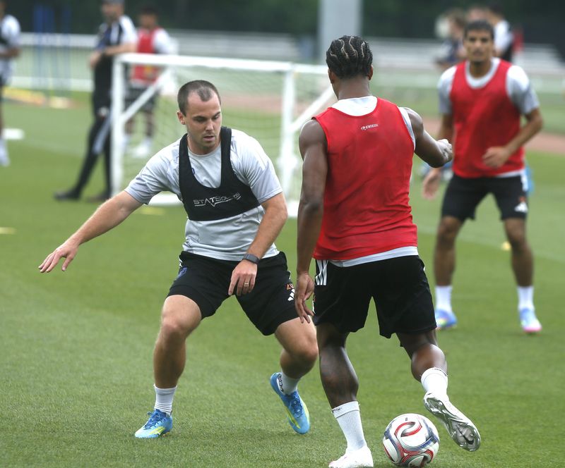 Pavel Bucha keeps an eye on Kristian Fletcher with the ball during FC Cincinnati training July 7, 2026, at Mercy Health Training Center in Milford.