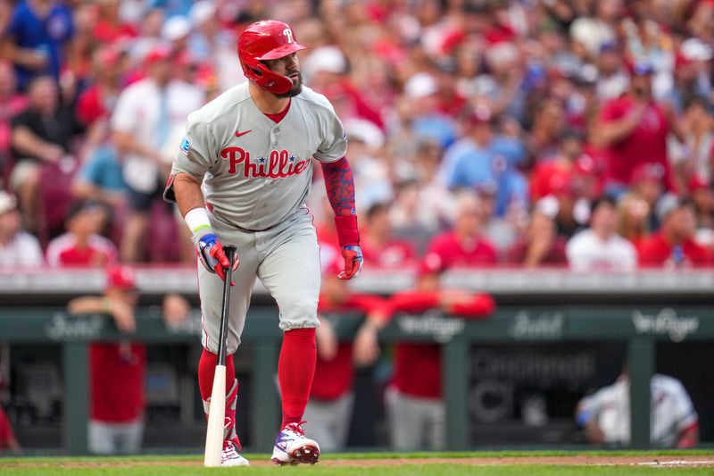 Philadelphia Phillies designated hitter Kyle Schwarber (12) walks for first base as he hits a two-run home run in the third inning of the MLB National League game between the Cincinnati Reds and the Philadelphia Phillies at Great American Ball Park in downtown Cincinnati on Tuesday, July 7, 2026. The Phillies led 3-0 after three innings.