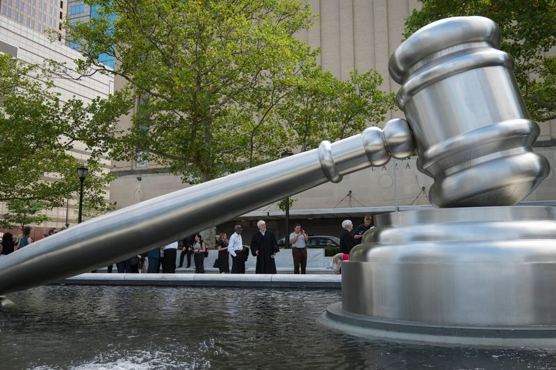 As part of the Justice In Motion bus tour from Pennsylvania to Michigan, former judges gather outside the Ohio Supreme Court building during a stop in Columbus, Ohio on July 8, 2026. The civic engagement tour is promoting a constitutional government to ensure equal justice under the law and public trust in the judicial system.