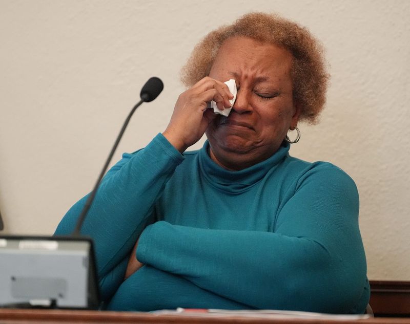 Wittness Coreatha Hutch, Sharee Hutch’s adopted mother, tears up as she listens to the 911 call she made on the night of Sharee Hutch’s death during the bench trial of her brother-in-law John Lorkowski, 48 of Stow, in Summit County Common Pleas Court Judge Joy Malek Oldfield's courtroom in Akron, Ohio on July 8, 2026. Lorkowski is accused of killing his niece, 32-year-old Sharee Hutch, by stabbing her multiple times on Nov. 6, 2024. Prosecutors say the two were engaged in a longstanding romantic relationship.