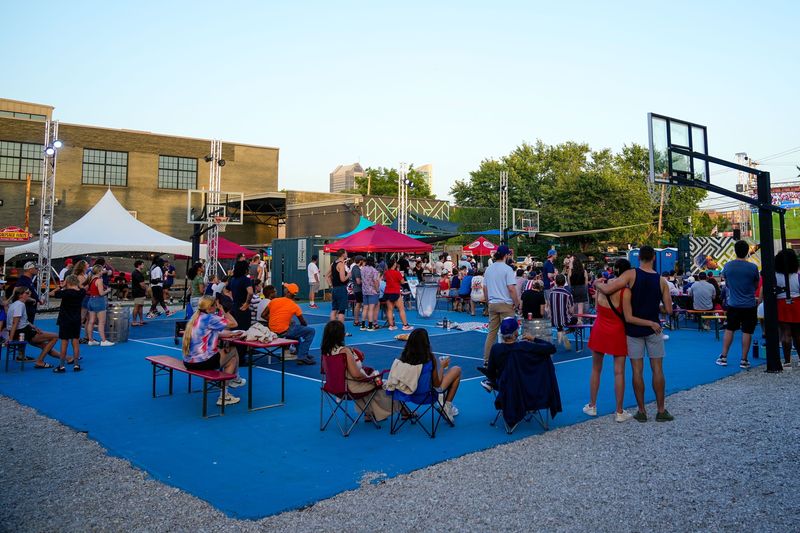 Patrons watch the United States men's national team compete in the World Cup on a large LED screen at Land-Grant Brewing Company’s Gravity Experience Park on July 1, 2026 in Columbus, Ohio.