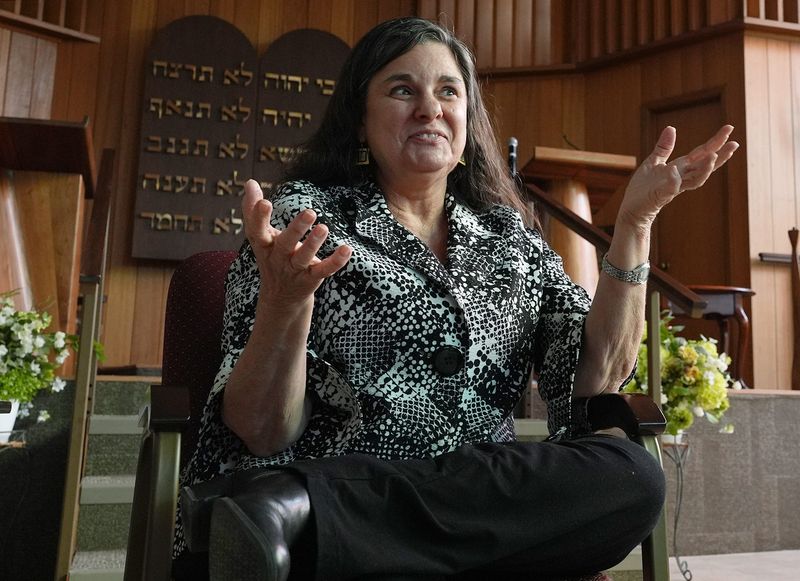 Rabbi Rachel Brown talks about artificial intelligence and how she uses it during an interview in the sanctuary of Beth Israel – The West Temple in Cleveland.