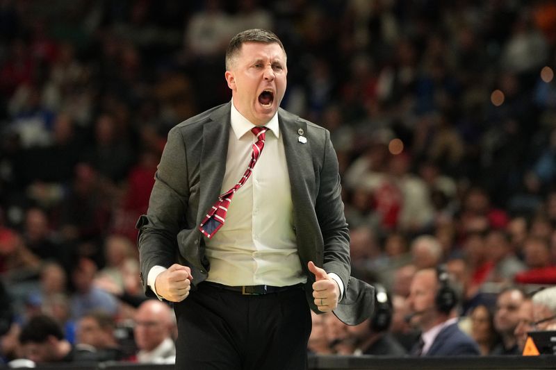 Mar 19, 2026; Greenville, SC, USA; Ohio State Buckeyes head coach Jake Diebler reacts against the Texas Christian University Horned Frogs in the second half during a first round game of the men's 2026 NCAA Tournament at Bon Secours Wellness Arena. Mandatory Credit: Bob Donnan-Imagn Images