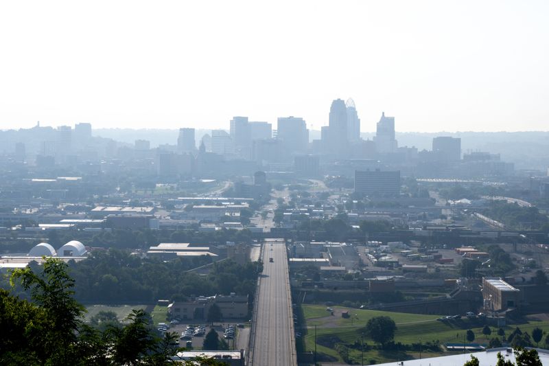 A view of Cincinnati’s downtown from East Price Hill on Thursday, July 16, 2026. The National Weather Service issued an air quality warning for the region.