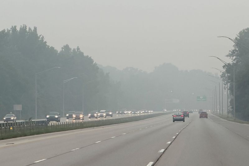 With an air quality alert in effect, cars travel along a hazy SR-315 through Columbus on July 17, 2026.