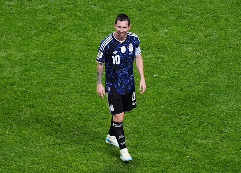 Argentina's Lionel Messi celebrates after a World Cup win over England on July 15.
