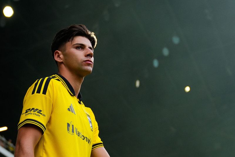 Columbus Crew midfielder Max Arfsten (27) takes the field before the game against FC Cincinnati at ScottsMiracle-Gro Field on July 25, 2026 in Columbus, Ohio.