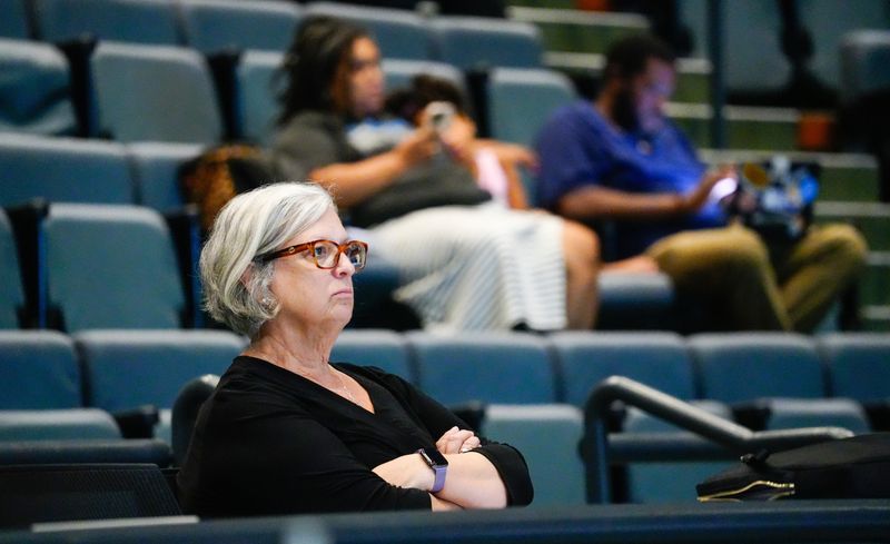 Cincinnati Federation of Teachers President Julie Sellers listens to a Cincinnati Public Schools board meeting where board members decide whether to pass a levy for placement on the November ballot on Monday, July 27, 2026.