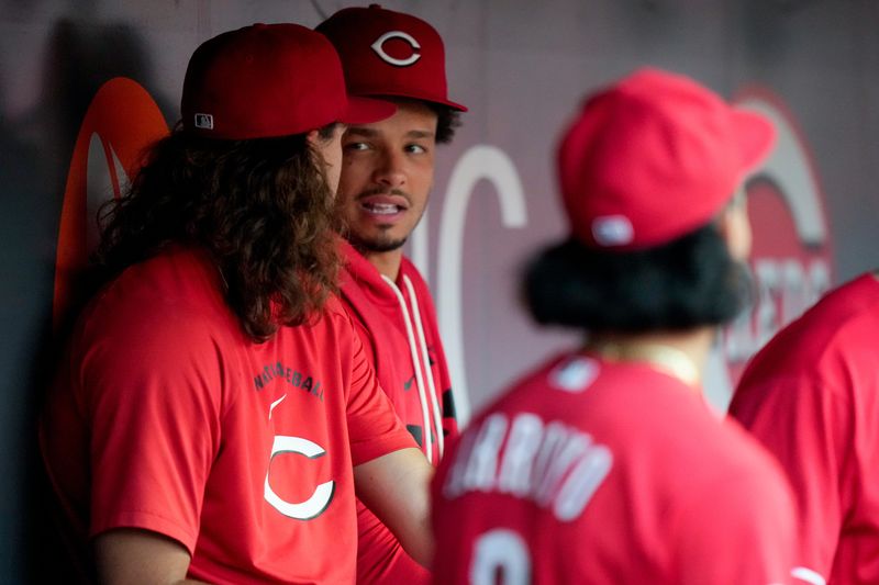 The development of Chase Burns (facing camera) and Rhett Lowder (left) are big reasons the Reds believe they can win next season even if former ace Hunter Greene misses most or even all of next season.