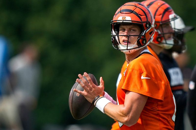 Cincinnati Bengals quarterback Joe Burrow (9) throws a pass during the first day of Cincinnati Bengals training camp at the Paycor Stadium practice facility in downtown Cincinnati on Wednesday, July 29, 2026.