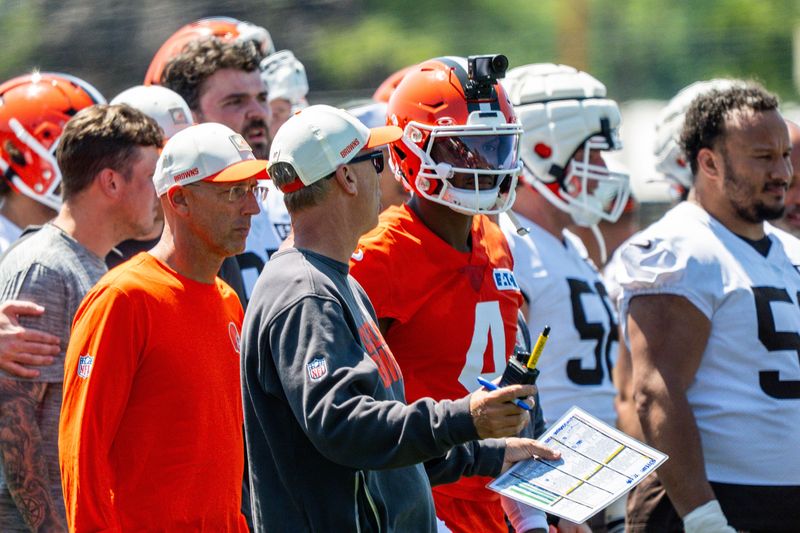 Cleveland Browns coach Todd Monken works with Cleveland Browns quarterback Deshaun Watson (4) during the second day of training camp, July 30, 2026, in Berea, Ohio.