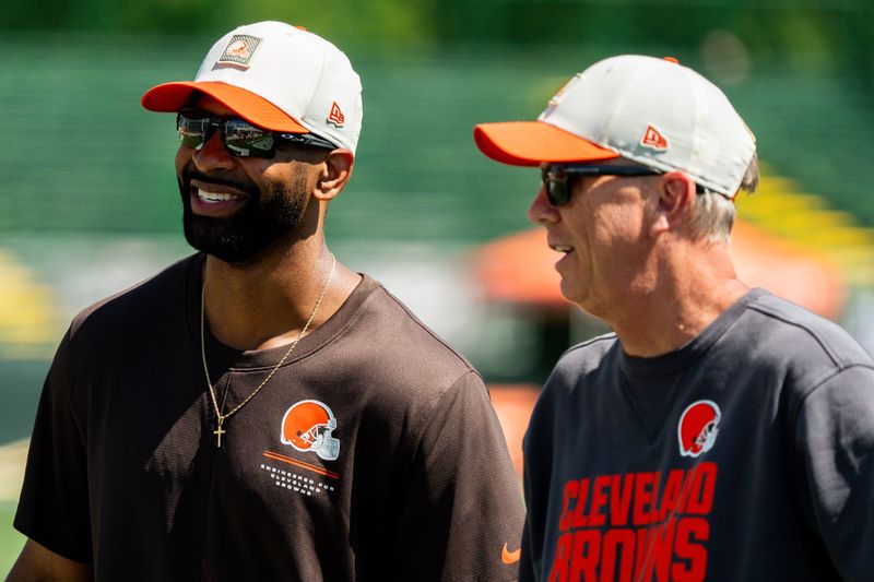 Cleveland Browns general manager Andrew Berry, left and Cleveland Browns coach Todd Monken walk off the field at the end of the second day of training camp, July 30, 2026, in Berea, Ohio.