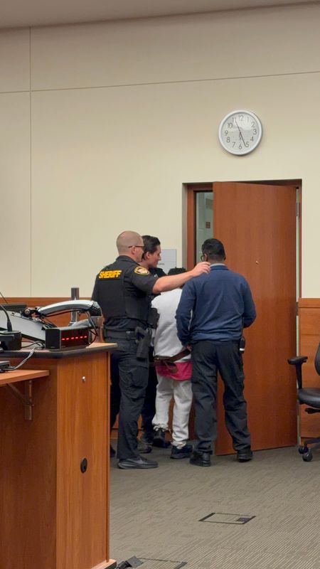 Pammy Maye is escorted back into a holding cell after an outburst in Franklin County Common Pleas Court.