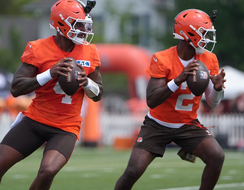Browns quarterbacks Deshaun Watson and Shedeur Sanders drop back to pass during training camp, July, 31, 2026, in Berea.