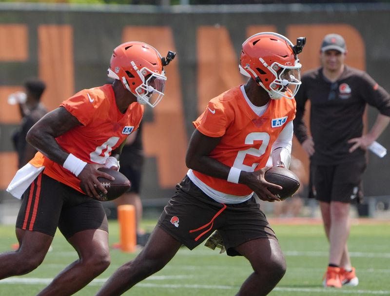Cleveland Browns quarterbacks Deshaun Watson and Shedeur Sanders take part in a passing drill during training camp, July, 31, 2026, in Berea.