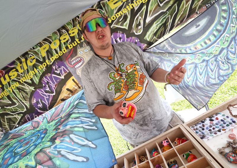 Russell Stafford of Rustic Possum Emporium explains the history behind his colorful, eclectic and upcycled art style. He commonly reuses silverware, tin cans, or pieces of abandoned wood as the centerpieces of his art.