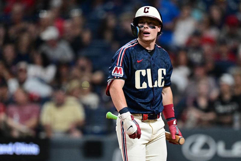 Guardians second baseman Travis Bazzana walks to the dugout after striking out during the ninth inning against the Arizona Diamondbacks, July 31, in Cleveland. Arizona won 4-1.