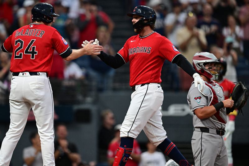 Aug 1, 2026; Cleveland, Ohio, USA; Cleveland Guardians first baseman Rhys Hoskins (8) celebrates with designated hitter Chase DeLauter (24) after hitting a two run home run during the first inning against the Arizona Diamondbacks at Progressive Field. Mandatory Credit: David Dermer-Imagn Images