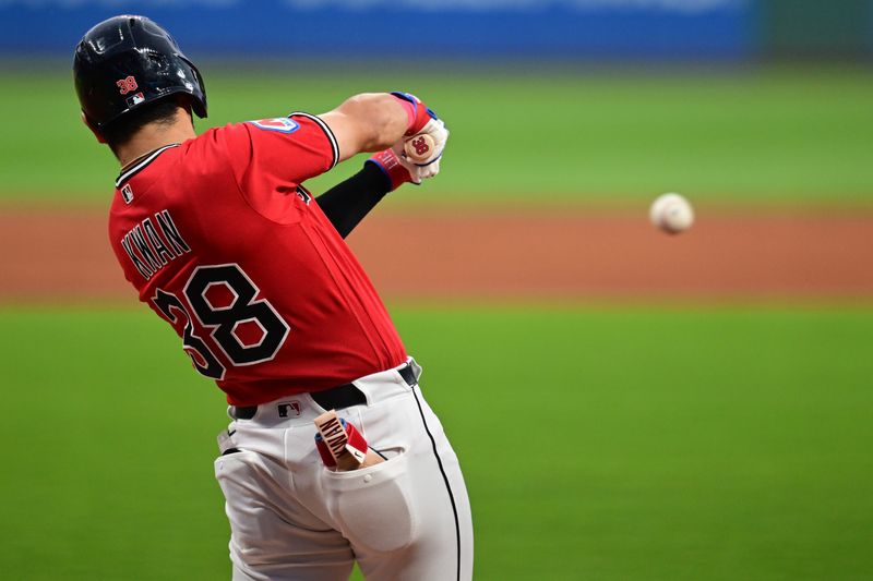 Guardians left fielder Steven Kwan hits a single during the first inning against the Arizona Diamondbacks, Aug. 1, 2026, in Cleveland.