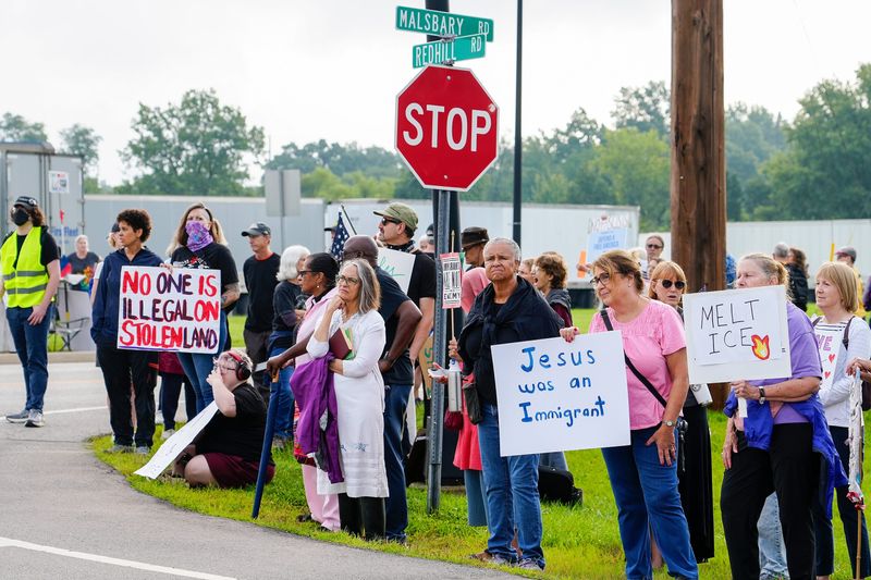 Protesters gather outside the Immigration and Customs Enforcement Cincinnati Field Office. ICE detained Springfield pastor Gilbert Joubert Adrien on Aug. 20.