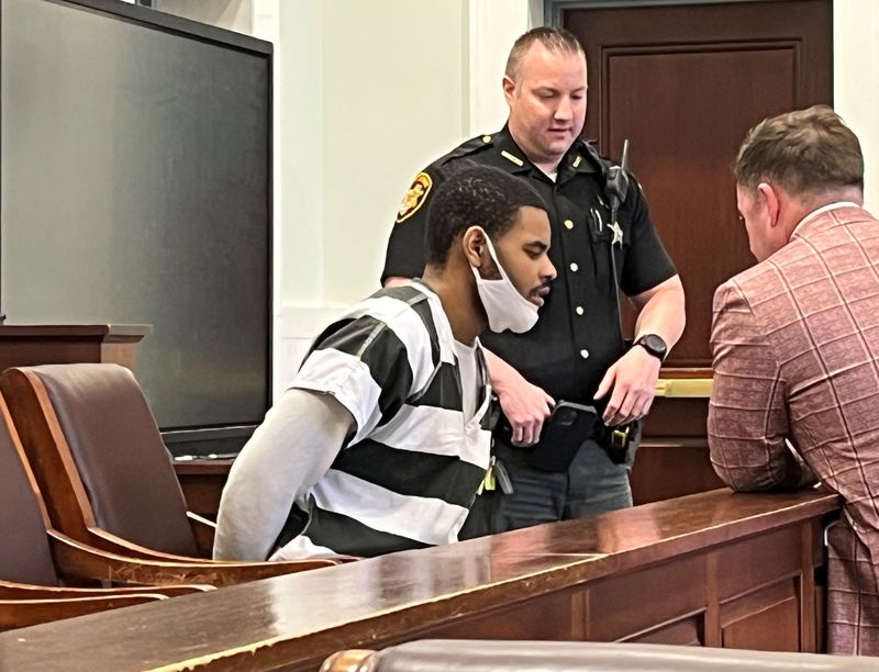 Marcello Whitehead talks to his attorney, Brandon Fox, at right, before his arraignment in Hamilton County Common Pleas Court on Aug. 3, 2026.