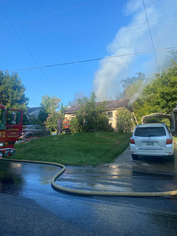 Madison Township firefighters battle a house fire at 973 N. Trimble Road about 8 a.m. Aug. 4.