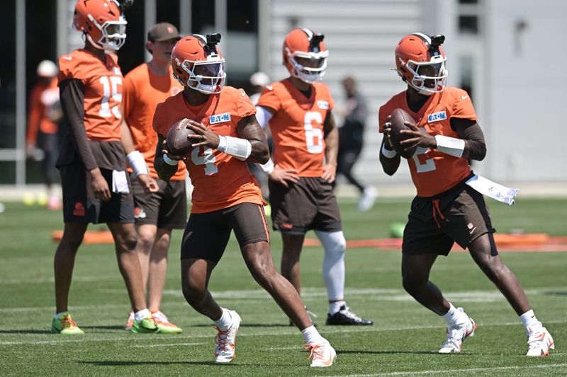 Jul 30, 2026; Berea, OH, USA; Cleveland Browns quarterback Shedeur Sanders (2) and quarterback Deshaun Watson (4) throws passes during training camp at CrossCountry Mortgage Campus. Mandatory Credit: Ken Blaze-Imagn Images