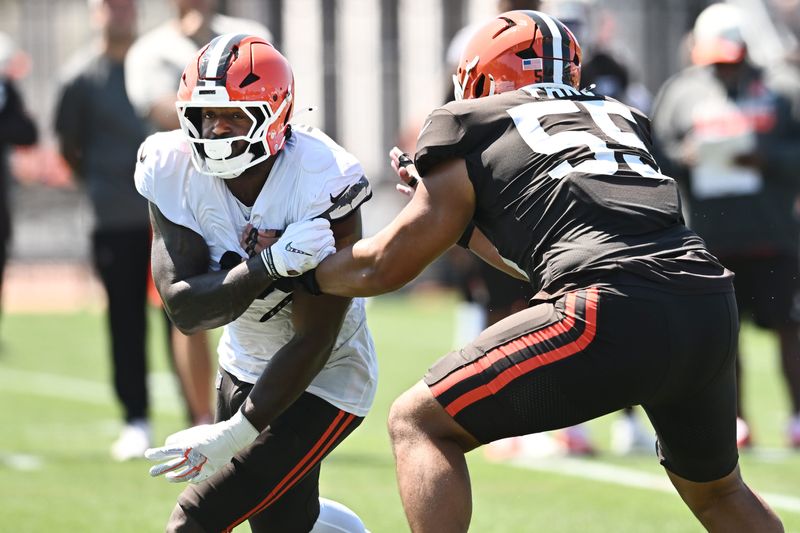 Aug 4, 2026; Berea, OH, USA; Cleveland Browns offensive tackle Spencer Fano (55) blocks defensive end Jared Verse (8) during training camp at CrossCountry Mortgage Campus. Mandatory Credit: Ken Blaze-Imagn Images