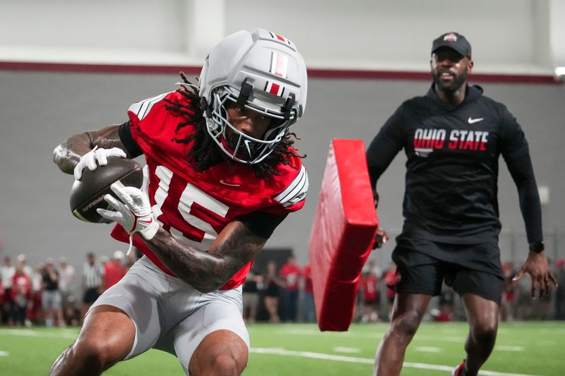 Ohio State wide receiver Chris Henry Jr. catches a pass during the Buckeyes' Aug. 7 practice at the Woody Hayes Athletic Center.