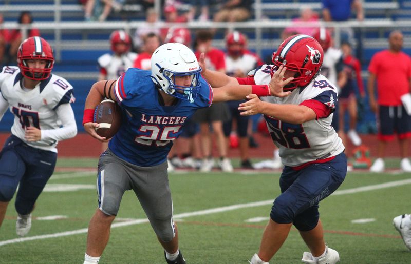 Lakewood's Ashton Tackett stiff-arms a Fairfield Christian defender during a home scrimmage at Calhoun Memorial Field on Aug. 7, 2026.