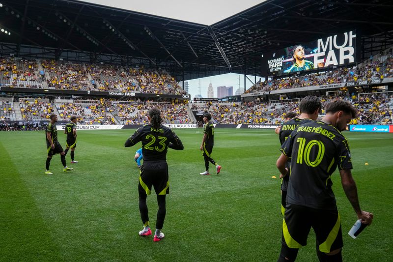 Columbus Crew players prepare to take the field for the Leagues Cup match against CF Pachuca at ScottsMiracle-Gro Field in Columbus on Aug. 7, 2026.