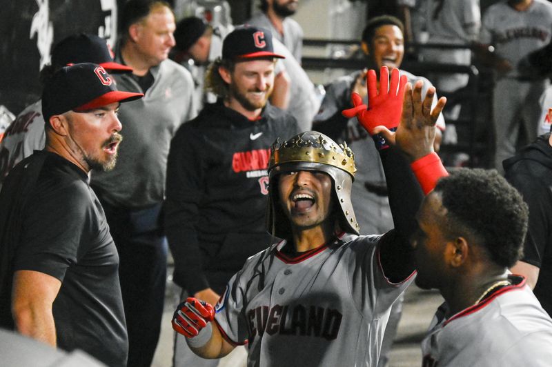 Aug 7, 2026; Chicago, Illinois, USA; Cleveland Guardians left fielder Steven Kwan (38) celebrates in the dugout after hitting a home run sixth inning against the Chicago White Sox at Rate Field.