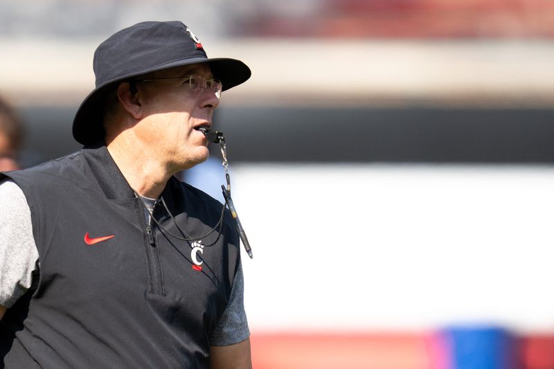 Cincinnati Bearcats head coach Scott Satterfield walks the field during the Cincinnati Bearcats football practice at Nippert Stadium in Cincinnati on Saturday, Aug. 8, 2026.