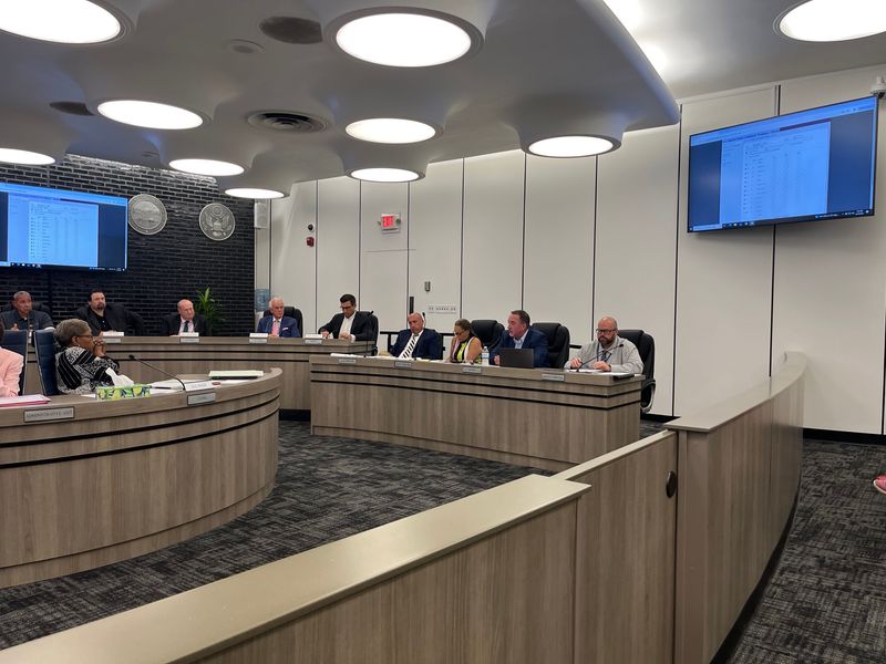 Canton Mayor William Sherer II briefs Canton council members on Aug. 10 about the highlights of the terms of the city's new annexation agreement with Canton, which council later approved 11-0.