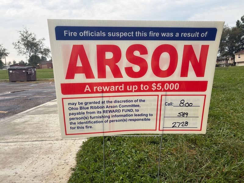 Arson signs are now posted at 712 Alan Page Dr. SE where two gunshot victims were found during a fire in Canton on Aug. 11.