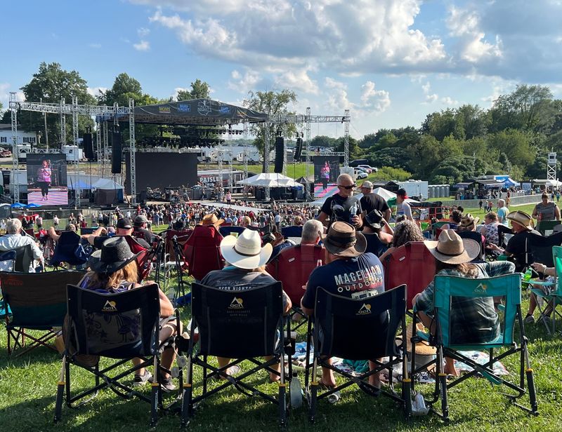 Fans enjoy live music at Neon Nights in 2024. The event, featuring country music headliners Rascal Flatts and Billy Currington, returns to Clay's Resort Jellystone Park Aug. 14-15.