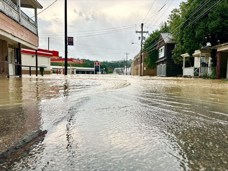 Heavy rains brought major flooding to Crooksville during the early morning hours of Tuesday, Aug. 11, 2026, enough to push waters over the sidewalks on West Main Street. Rescue efforts from multiple first responder agencies assisted with evacuations as many in the village lost power or had their homes submerged in water.
