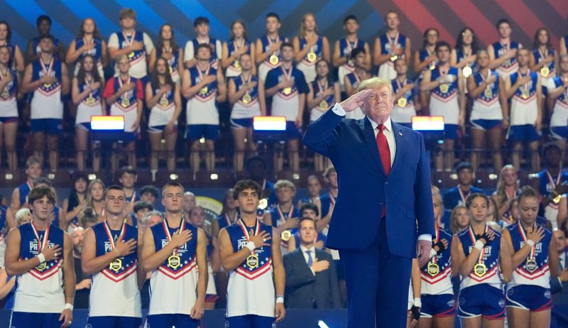 President Donald Trump joins the Patriot Games competitors for the playing of the national anthem before the start of the semifinals at Spire Academy, Aug. 11, 2026, in Geneva, Ohio.
