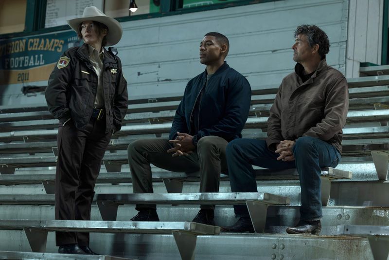 Kelly Macdonald as Sheriff Kerry, left, Aaron Pierre as John Stewart and Kyle Chandler as Hal Jordan in the HBO series "Lanterns."