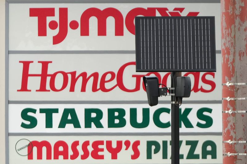 A series of Flock Safety cameras monitor license plates heading into and out of the Graceland shopping center in Columbus on Aug. 13, 2026.