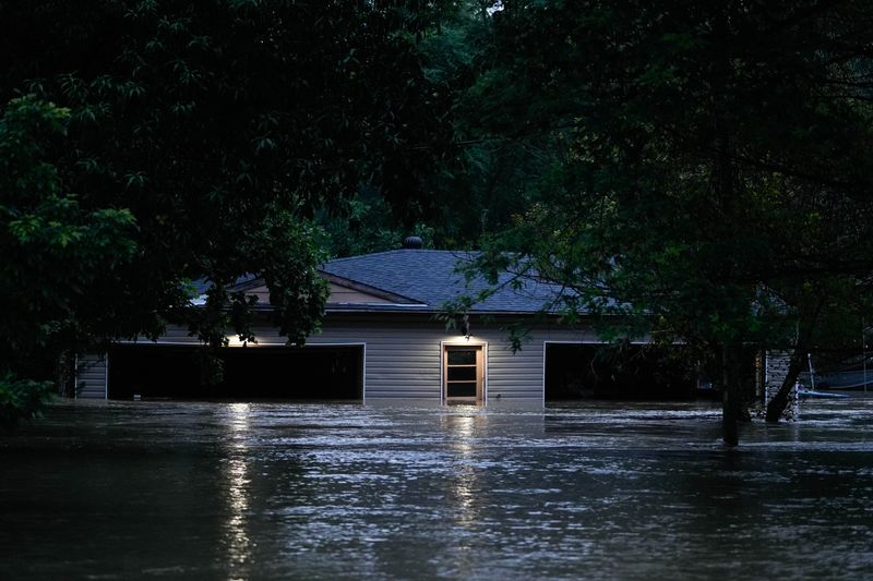 A garage on Lawrenceburg Road is underwater after a night of heavy rain, areas around Harrison and Lawrenceburg are under a flood warning and some evacuations have been made.