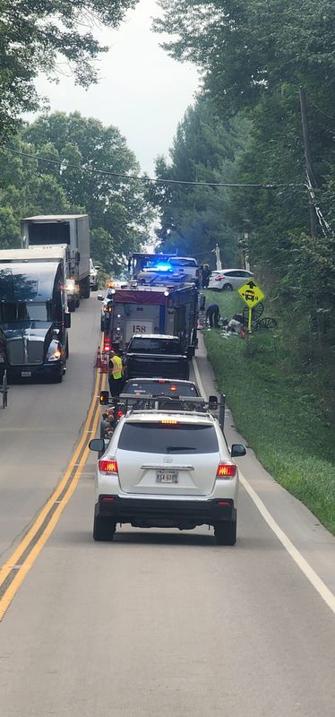 An Amish woman in a horse-drawn buggy was hurt when a pickup trying to pass on U.S. Route 62 sideswiped her buggy, totaling the buggy