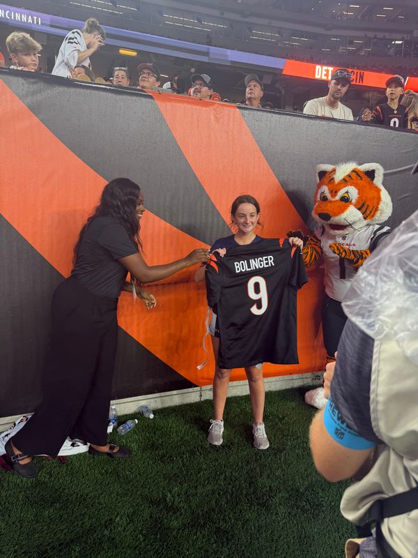 Penelope Bolinger, a recent St. Ursula Academy graduate, was named the 2026 Bengals Girls Flag Football Player of the Year during halftime of the Cincinnati Bengals preseason opener on Aug. 13, 2026
