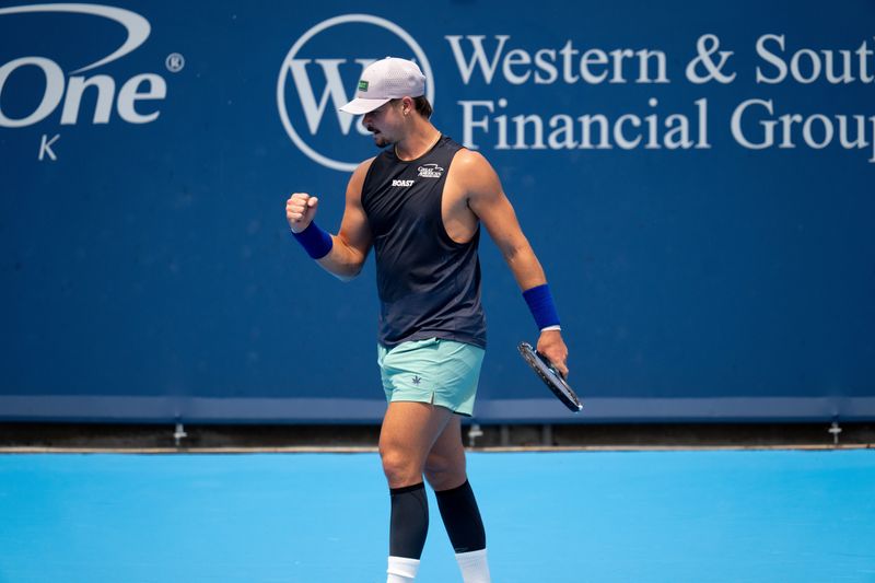 J.J. Wolf, of the United States, reacts after a hit to James Duckworth, of Australia, at the Cincinnati Open at the Lindner Family Tennis Center in Mason, Ohio, on Friday, August 14, 2026.