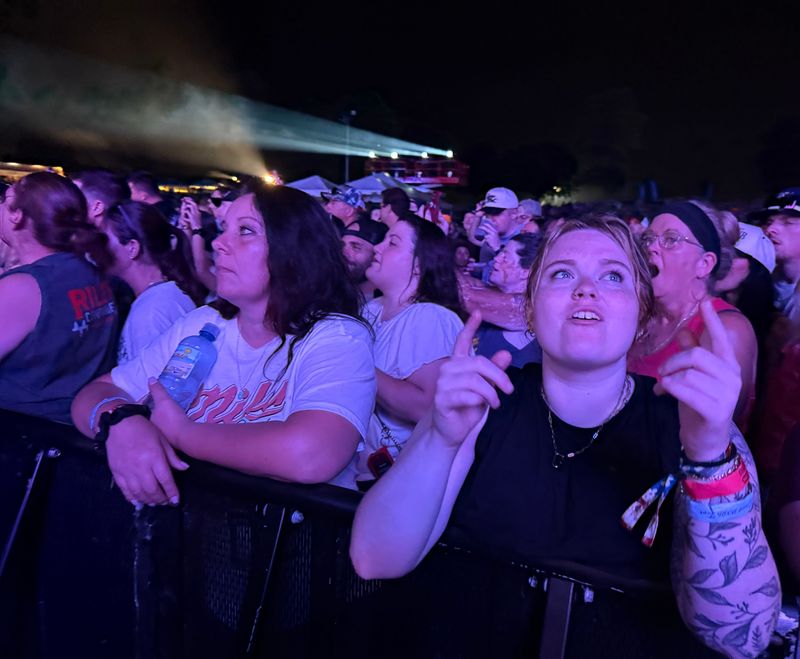 Fans enjoy headliner Rascal Flatts on Aug. 14 at Neon Nights at Clay's Resort Jellystone Park in Lawrence Township. The country music festival continues Aug. 15 with headliner Billy Currington.
